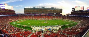 Why Each of the Remaining 8 Teams Could Win the Super Bowl A stunning panoramic shot of Levi's Stadium in Santa Clara during a packed football game at sunset.
